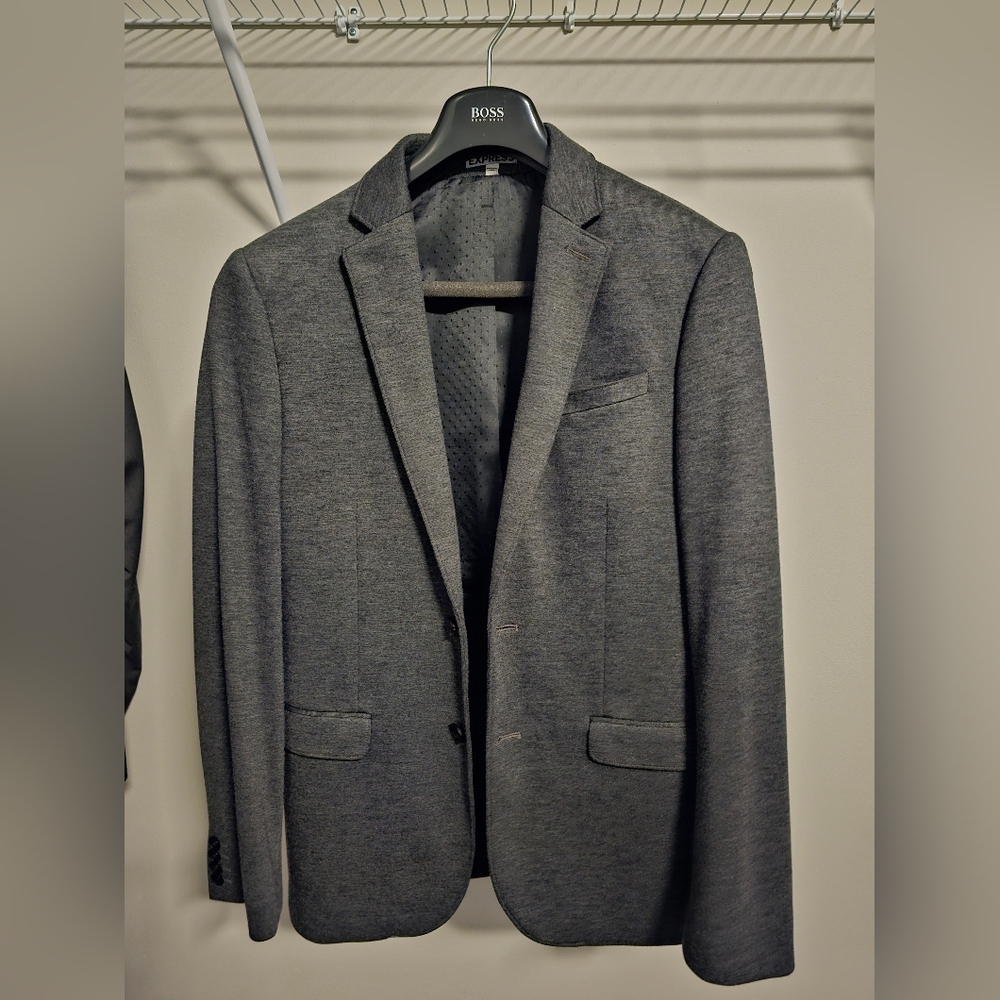 Express photographer fitted sports coat